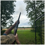 Flightline Sporting Close Up image of a man shooting a gun