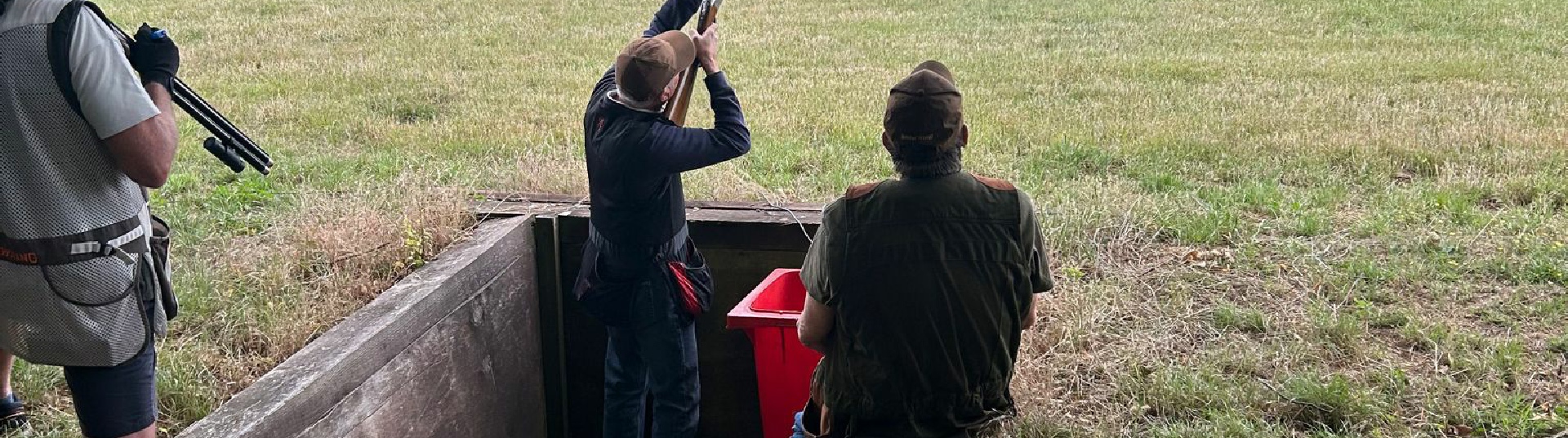 Flightline Sporting Man shooting a gun from a pit