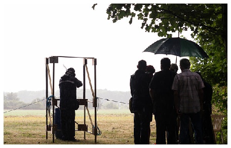 Flightline sporting image of a man shooting a shotgun
