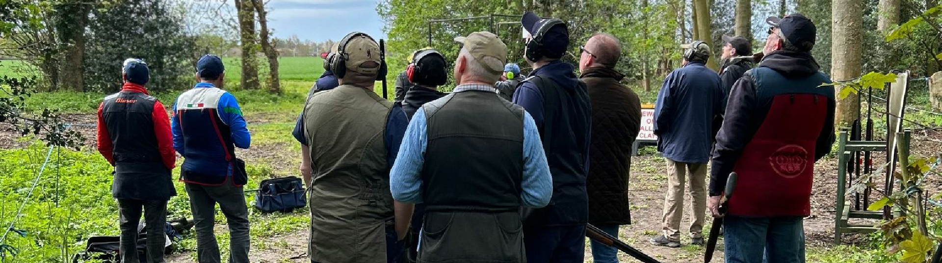 Flightline Sporting people shooting shotguns